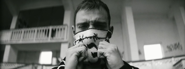 Video Reference: Face, Head, Black-and-white, Photography, Monochrome, Hand, Monochrome photography, Eyewear, Finger, Personal protective equipment, Person