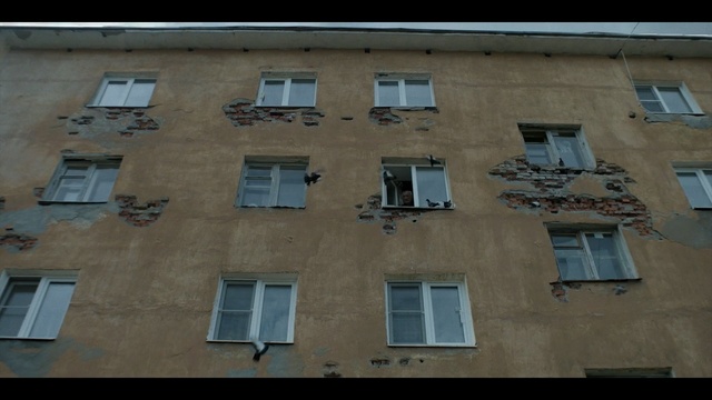 Video Reference: Property, Facade, Wall, Building, Architecture, Window, Neighbourhood, Apartment, House, Material property, Person