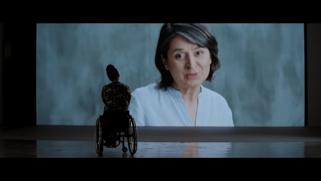 Video Reference: Sitting, Human, Sky, Photography, Screenshot, Adaptation, Wheelchair, Scene, Flash photography, Person