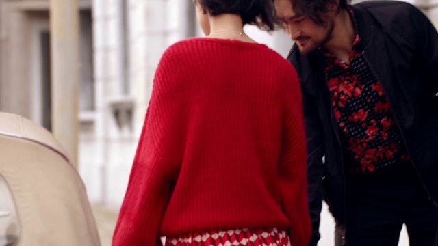 Video Reference: Clothing, Red, Outerwear, Sweater, Fashion, Neck, Street fashion, Sleeve, Top, Cardigan