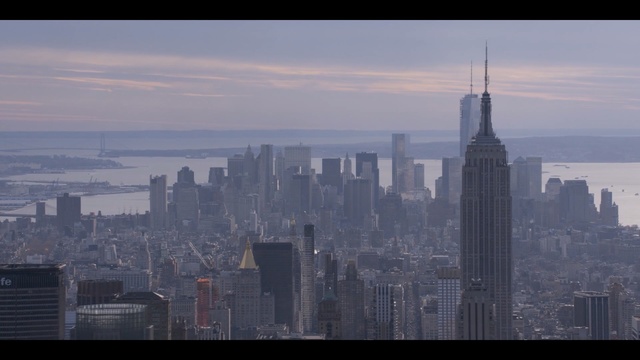 Video Reference: metropolitan area, skyline, city, cityscape, urban area, skyscraper, metropolis, daytime, sky, landmark, Person