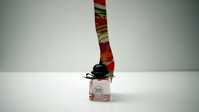 Video Reference: pack, product, scent, perfume, white background, studio, tape