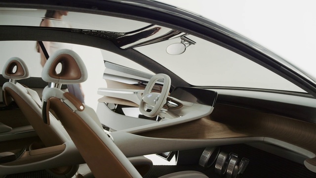 Video Reference: Vehicle, Car, Automotive design, Design, Automotive exterior, Steering wheel, Auto part, Mid-size car, Concept car, Indoor, Mirror, Window, Sitting, Table, Front, Desk, View, Seat, White, Computer, Dog, Sink, Parked, Motorcycle, Automotive, Wheel, Control panel