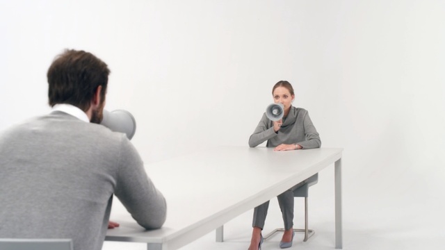 Video Reference: Conversation, Sitting, Table, Design, Room, Architecture, Furniture, Interior design, Gesture, Training, Person, Male