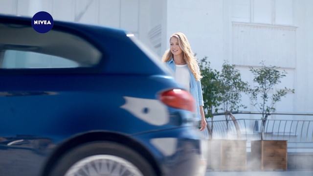 Video Reference: Land vehicle, Vehicle, Car, Blue, Vehicle door, Automotive design, Luxury vehicle, City car, Automotive exterior, Person