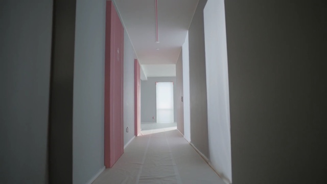 Video Reference: Property, Light, Room, Architecture, Wall, Floor, Line, Building, House, Ceiling, Indoor, Small, Door, White, Open, Sitting, View, Empty, Wooden, Large, Red, Mirror, Bed, Window, Plaster