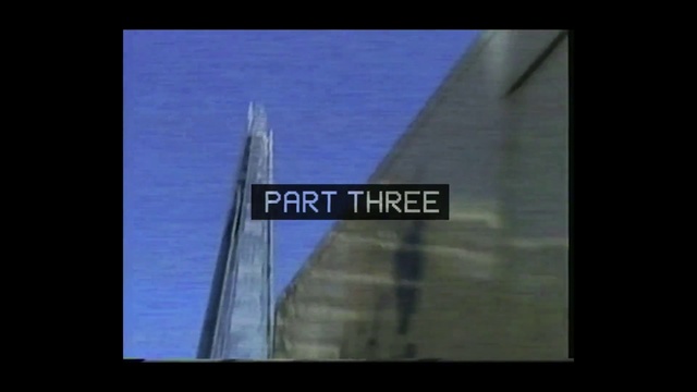 Video Reference: Blue, Skyscraper, Architecture, Line, Landmark, Text, Daytime, Sky, Snapshot, Atmosphere