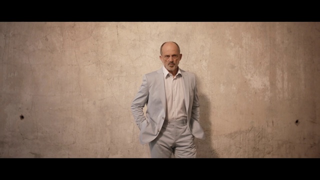 Video Reference: Photograph, Portrait, Human, Photography, Facial hair, Suit, Beard, Moustache