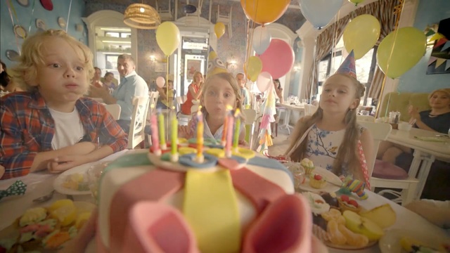 Video Reference: party, food, function hall, birthday, fun, cake decorating, confectionery, Person