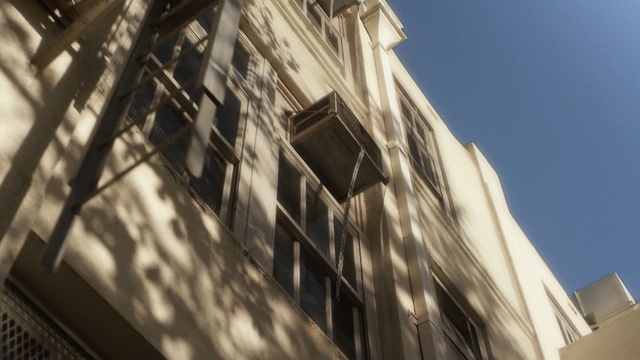 Video Reference: building, sky, landmark, architecture, daytime, skyscraper, facade, metropolis, angle, window