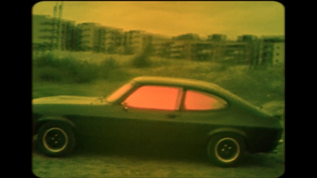 Video Reference: car, yellow, vehicle, motor vehicle, automotive design, ford capri, performance car, compact car, sky, family car