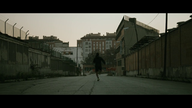 Video Reference: Town, Neighbourhood, Urban area, Residential area, Street, Mode of transport, Snapshot, Road, Morning, Wall