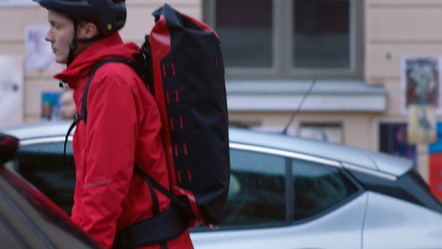 Video Reference: Red, Vehicle door, Vehicle, Automotive exterior, Car, Outerwear, Jacket, Personal protective equipment, Automotive window part, Auto part, Person