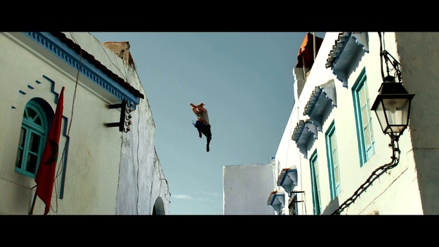 Video Reference: Stunt performer, Street stunts, Freestyle walking, Flip (acrobatic), Extreme sport, Photography, Recreation, Fictional character, Screenshot, Person