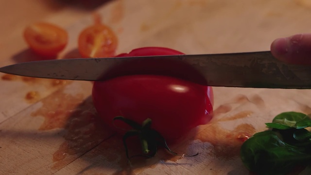 Video Reference: Knife, Food, Kitchen knife, Vegetable, Tomato, Solanum, Plant, Cutlery, Produce, Fruit, Person