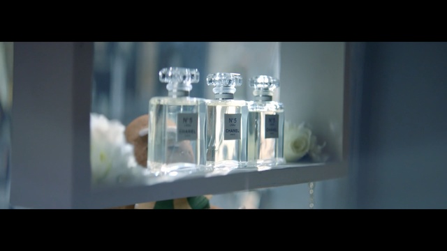 Video Reference: Water, Glass bottle, Glass, Perfume, Text, Transparent material, Display case, Font, Design, Photography