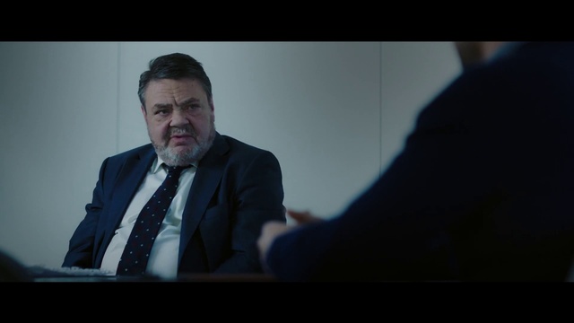 Video Reference: Glasses, Microphone, Tie, Dress shirt, Gesture, Collar, Spokesperson, Suit, Blazer, Formal wear