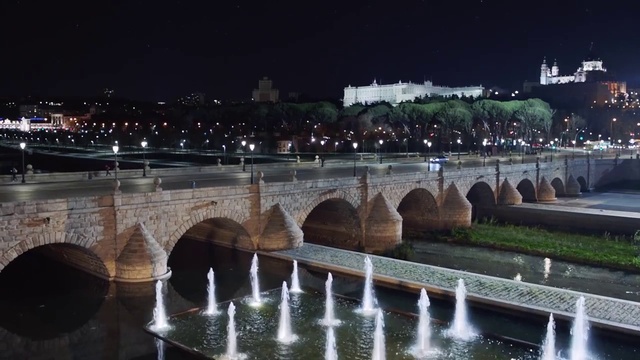 Video Reference: Water, Night, Arch bridge, Landmark, Reflecting pool, Bridge, Reflection, Town, Architecture, Aqueduct
