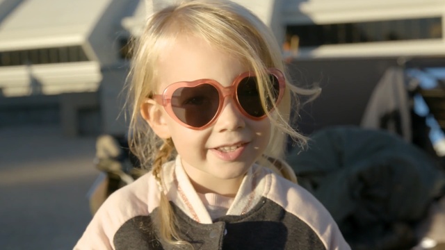 Video Reference: eyewear, glasses, sunglasses, vision care, human hair color, blond, girl, cool, child, product, Person