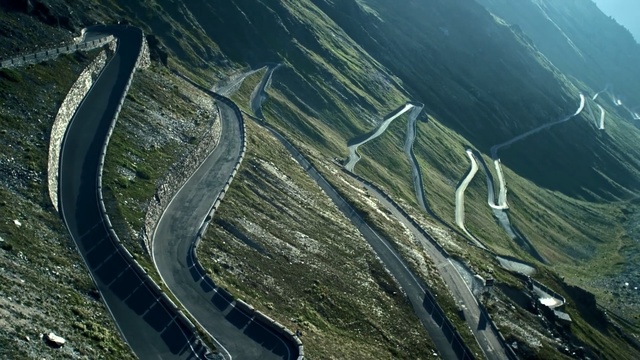 Video Reference: aerial photography, road, mountain pass, bird's eye view, photography, highway, fixed link, mountain range, mountain, landscape