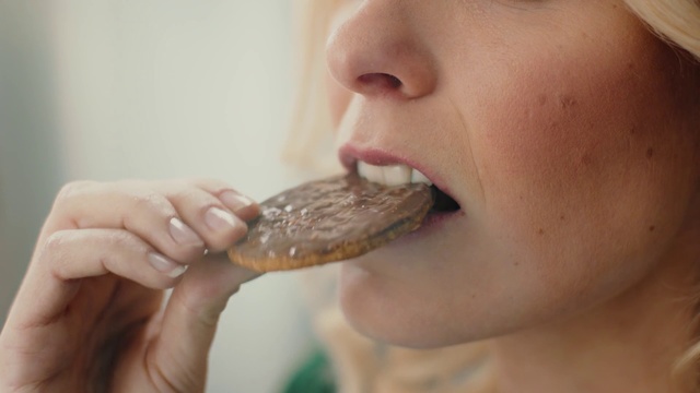Video Reference: Skin, Lip, Eating, Nose, Chin, Mouth, Close-up, Hand, Neck, Food craving