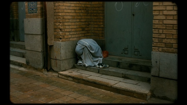 Video Reference: Wall, Brickwork, Screenshot, Photography, Flooring, Sitting, Wood, Floor, Brick, Door