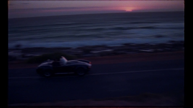 Video Reference: Sky, Vehicle, Sea, Morning, Calm, Car, Automotive design, Race car, Ocean, Landscape