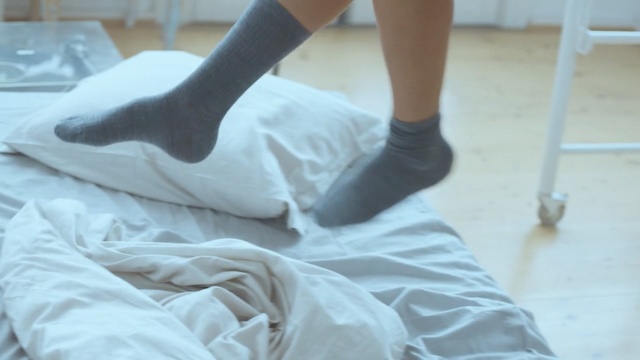 Video Reference: white, footwear, leg, joint, shoulder, floor, shoe, flooring, human leg, human body