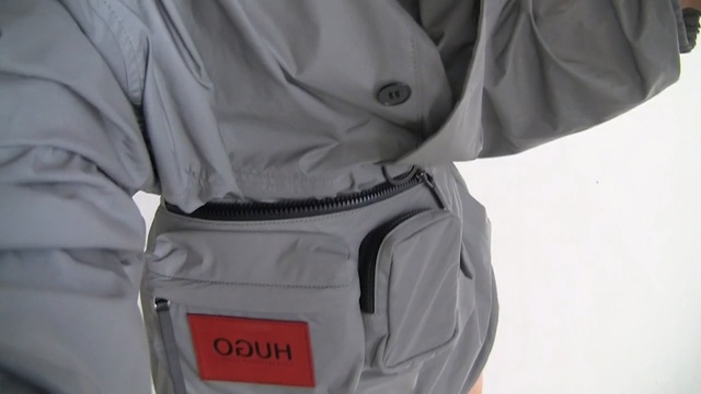 Video Reference: Outerwear, Backpack, Pocket, Jacket, Bag, Trousers, Luggage and bags, Sleeve