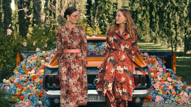 Video Reference: Orange, Fashion, Dress, Spring, Floral design, Tree, Street fashion, Event, Costume, Flower, Person