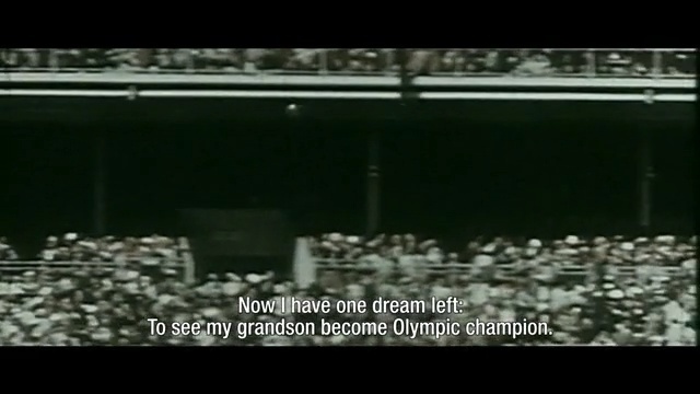 Video Reference: mecca, text, mode of transport, black and white, city, song, material, darkness, font, auditorium