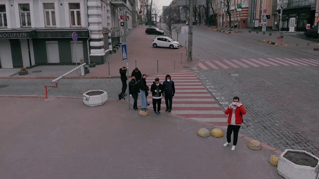 Video Reference: Pedestrian, Street, Lane, Road, Infrastructure, Sidewalk, Neighbourhood, Thoroughfare, Asphalt, Recreation