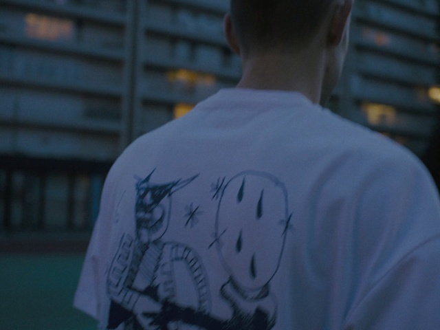 Video Reference: Blue, T-shirt, Sky, Font, Top, Photography, Shirt, Illustration, Neck, Back, Person