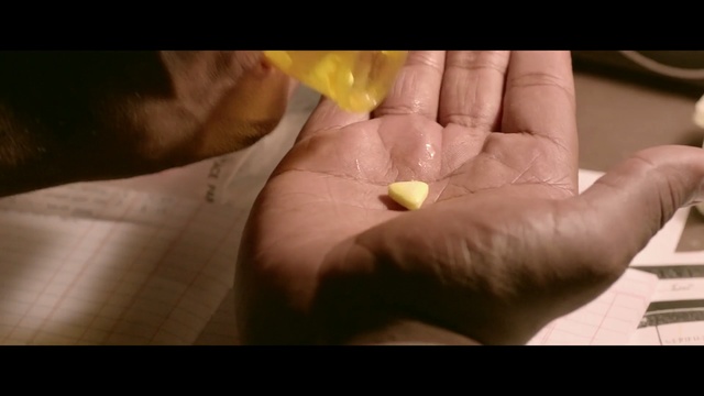 Video Reference: face, skin, finger, yellow, hand, nose, mouth, nail, close up, arm, Person