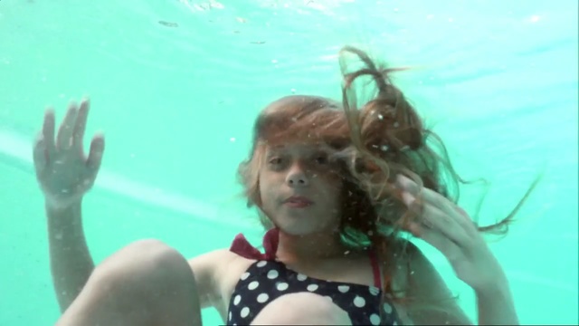 Video Reference: water, underwater, fun, leisure, vacation, summer, girl, organism, swimming, recreation, Person