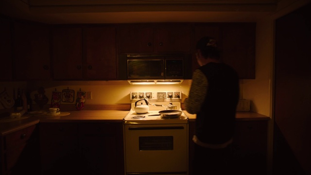 Video Reference: Room, Kitchen, Lighting, Darkness, Sky, Light fixture, Furniture, House, Night, Major appliance