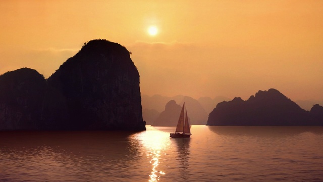 Video Reference: sun, sea, beach, ocean, star, celestial body, coast, water, sky, landscape, island, bay, travel, sand, vacation, coastline, sunset, summer, shore, mountain