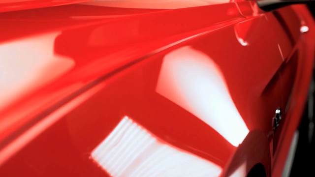 Video Reference: car, red, motor vehicle, automotive design, automotive lighting, light, orange, vehicle door, vehicle, automotive exterior