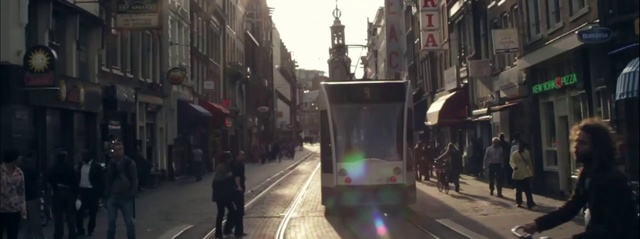 Video Reference: Pedestrian, Mode of transport, Town, Metropolitan area, Lane, Urban area, Street, Metropolis, Neighbourhood, Transport