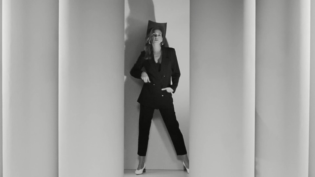 Video Reference: White, Standing, Black, Gentleman, Male, Black-and-white, Suit, Formal wear, Photography, Style, Person