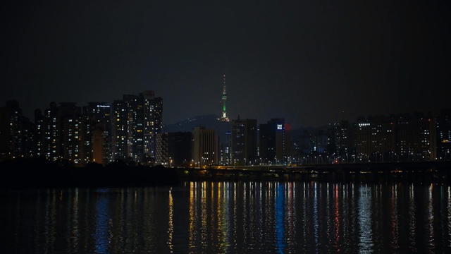 Video Reference: reflection, cityscape, city, skyline, night, metropolitan area, metropolis, skyscraper, urban area, water