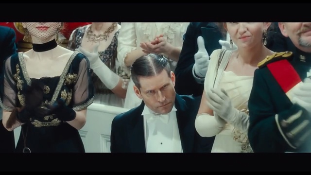 Video Reference: Hairstyle, Snapshot, Human, Event, Photography, Gentleman, Ceremony, Photo caption, Tradition, Fashion accessory, Person