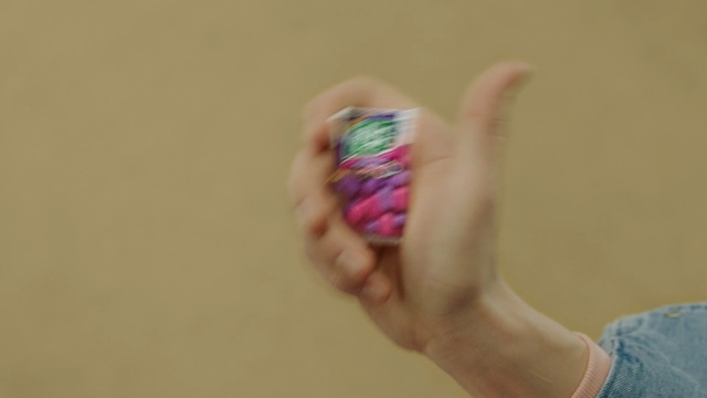 Video Reference: Finger, Hand, Nail, Skin, Wrist, Thumb, Arm, Toe, Foot, Gesture, Person, Indoor, Man, Holding, Woman, Playing, Young, Frisbee, Video, Girl, Game, Shirt, Blurry, Brushing, Standing, Teeth, Remote, Room, Catch, Air, Red, Blue, White, Doing