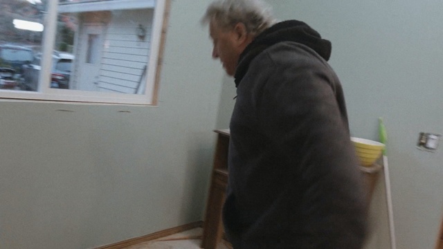 Video Reference: mammal, room, shoulder, floor, furniture, flooring, textile, joint, window, girl