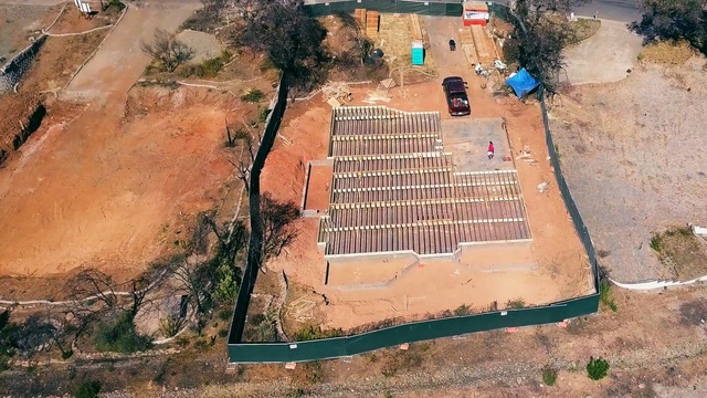 Video Reference: Aerial photography, Land lot, Construction, Photography, Soil, Archaeological site, History, Building