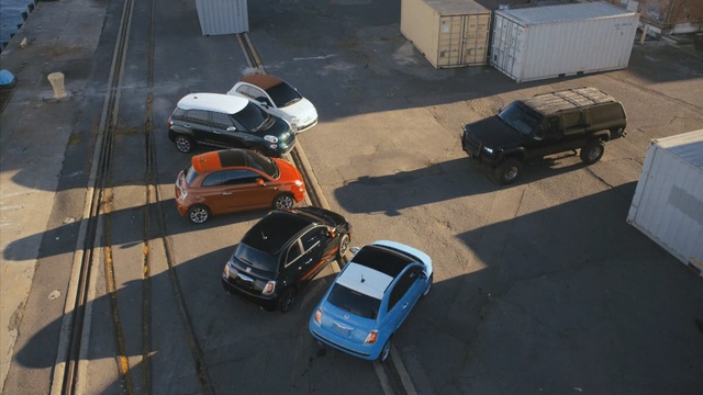 Video Reference: motor vehicle, car, asphalt, mode of transport, vehicle, floor, automotive exterior, road surface