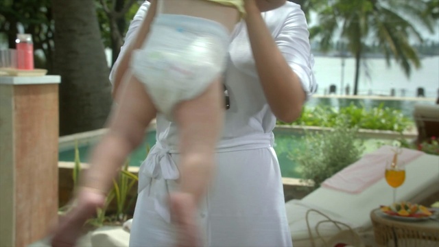 Video Reference: Clothing, Dress, Shoulder, Wedding dress, Abdomen, Bridal clothing, Joint, Waist, Trunk, Long hair