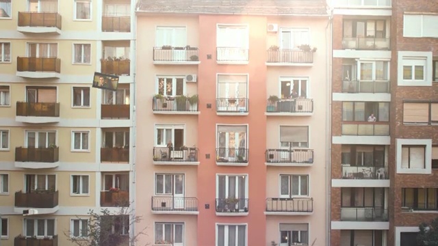 Video Reference: building, property, apartment, facade, window, condominium, real estate, mixed use, shelving, tower block, Person