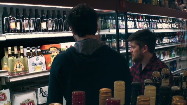 Video Reference: Liquor store, Liqueur, Retail, Distilled beverage, Alcohol, Convenience store, Supermarket, Building, Drink, Bar, Person