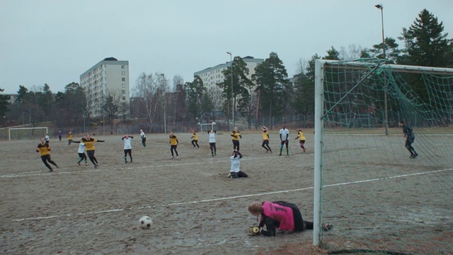 Video Reference: Team sport, Player, Soccer, Sports, Ball game, Football, Net, Competition event, Street football, Play, Person